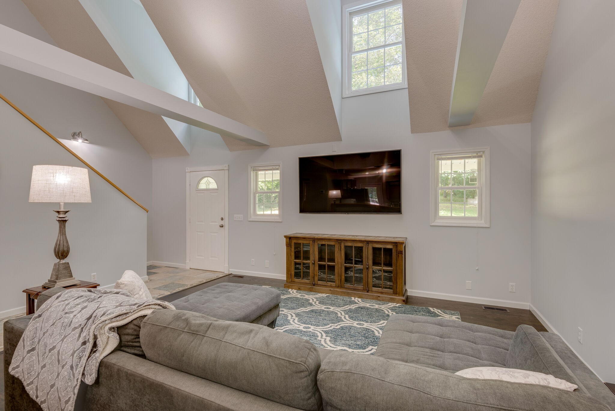 1803 East Piney Road Dickson, TN 37055 - Photo 9 of 46 a living room with fireplace furniture and a flat screen tv