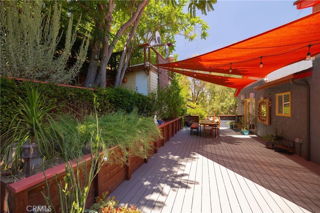 5341 Monterey Road Los Angeles, CA 90042 - Photo 29 of 40 backyard first level access from primary suite, guest bedroom 3 and property side stairs