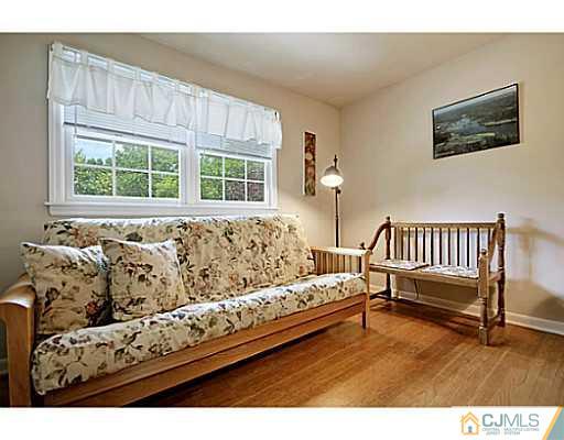 8 June Way Middlesex, NJ 08846 - Photo 18 of 25 a living room with furniture and a window