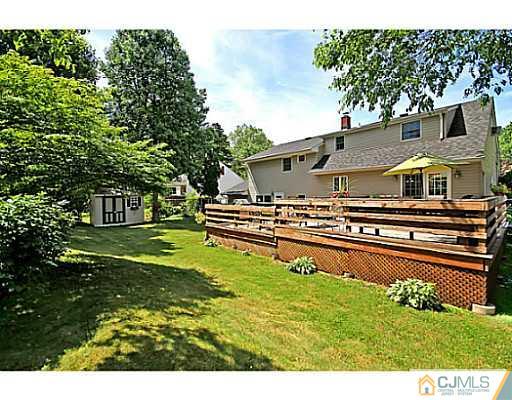 8 June Way Middlesex, NJ 08846 - Photo 24 of 25 a front view of a house with a yard
