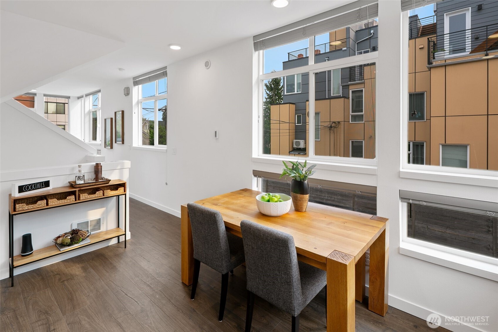 3531 Wallingford Avenue North Seattle, WA 98103 - Photo 11 of 33 a view of a dining room with furniture window and wooden floor
