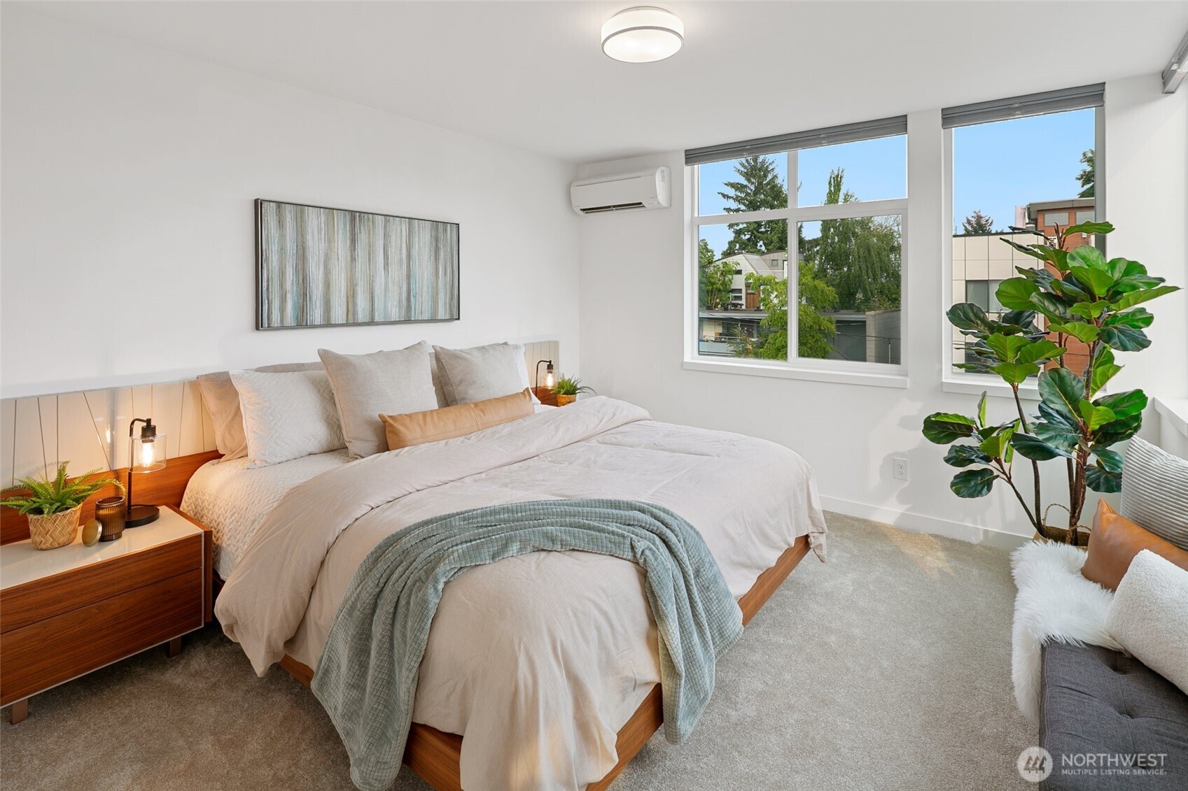 3531 Wallingford Avenue North Seattle, WA 98103 - Photo 13 of 33 a spacious bedroom with a bed and a window