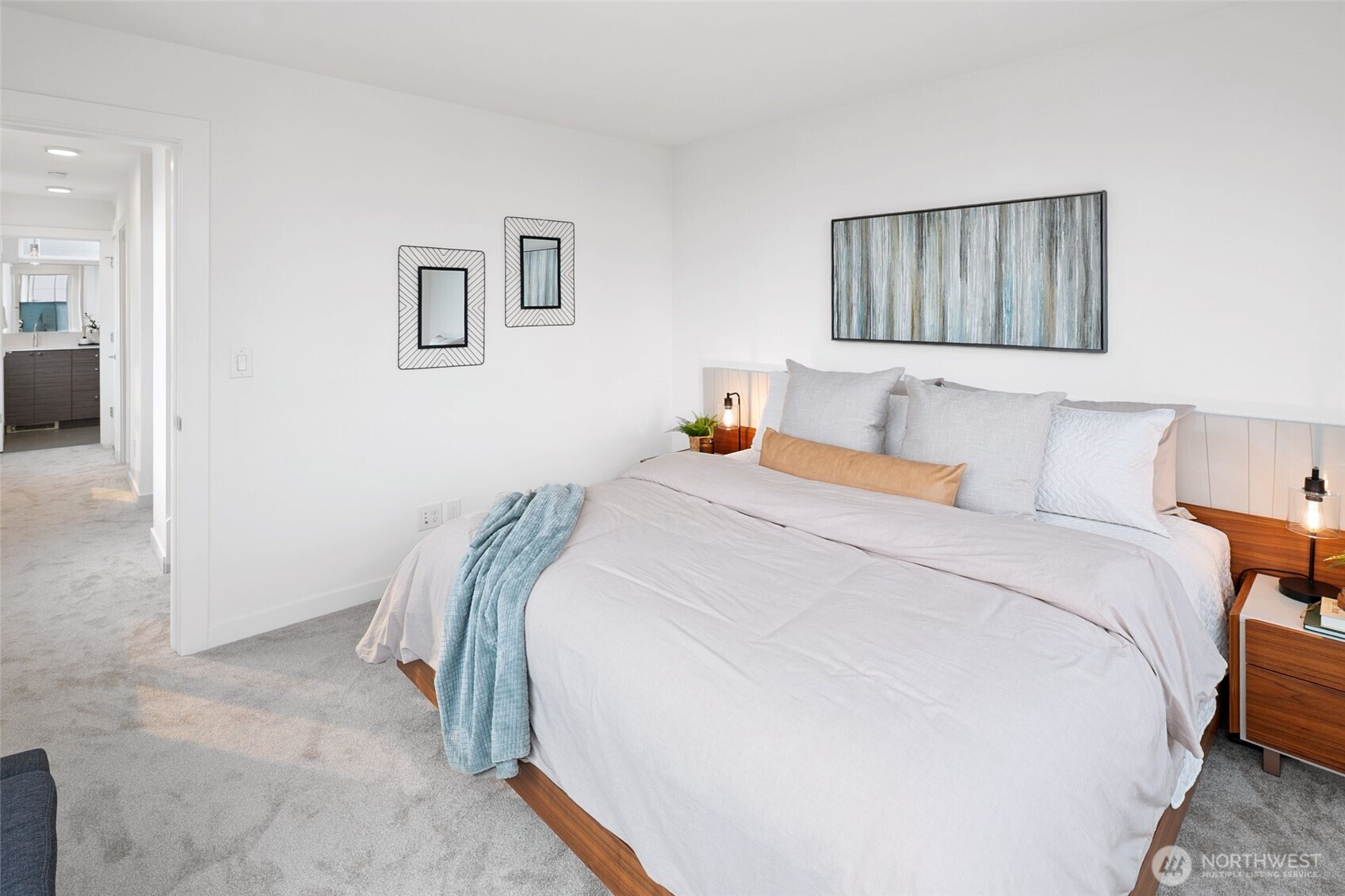 3531 Wallingford Avenue North Seattle, WA 98103 - Photo 17 of 33 a bedroom with a bed and a painting