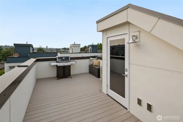 a kitchen with stainless steel appliances a stove top oven and cabinets