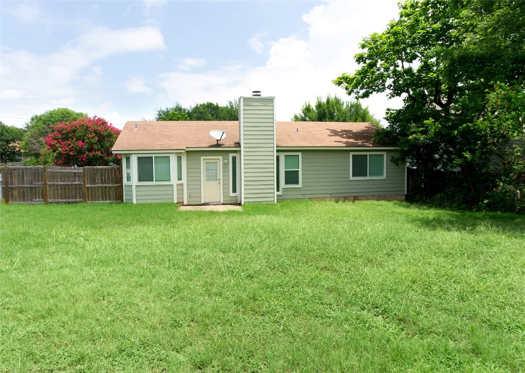 1915 Magazine Street Austin, TX 78727 - Photo 18 of 18 a front view of house with yard and green space