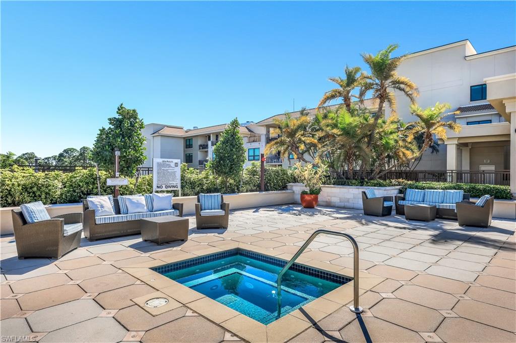 9115 Strada Place, Unit 5314 Naples, FL 34108 - Photo 29 of 49 a view of a patio with couches and potted plants