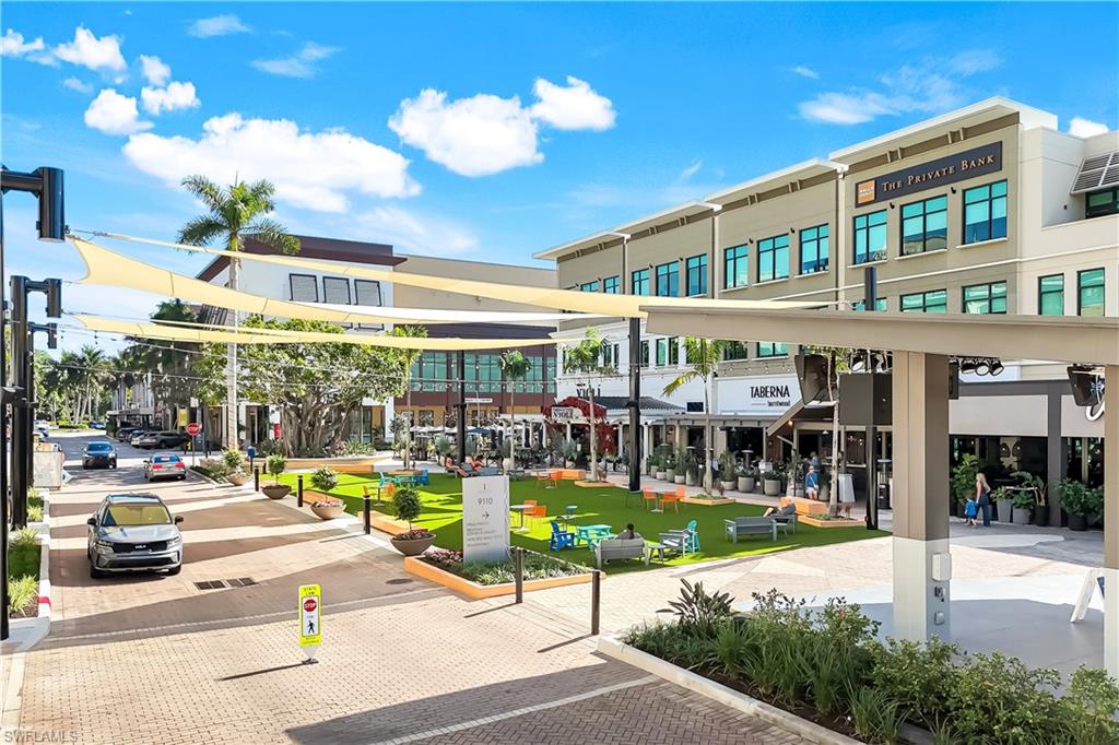 9115 Strada Place, Unit 5314 Naples, FL 34108 - Photo 40 of 49 a view of a swimming pool with a patio