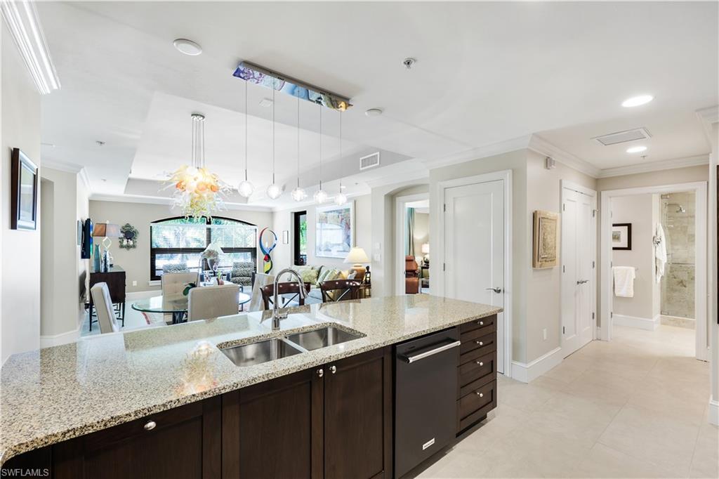 9115 Strada Place, Unit 5314 Naples, FL 34108 - Photo 7 of 49 a bathroom with a sink double vanity and a mirror