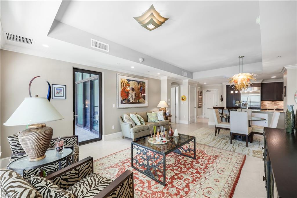 9115 Strada Place, Unit 5314 Naples, FL 34108 - Photo 10 of 49 a living room with furniture