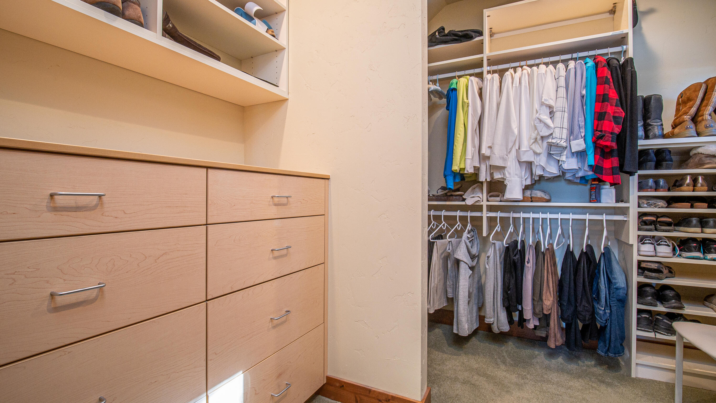 56988 Dancing Rock Loop Bend, OR 97707 - Photo 26 of 49 The walk-in closed has built-in organizers and dressers.
