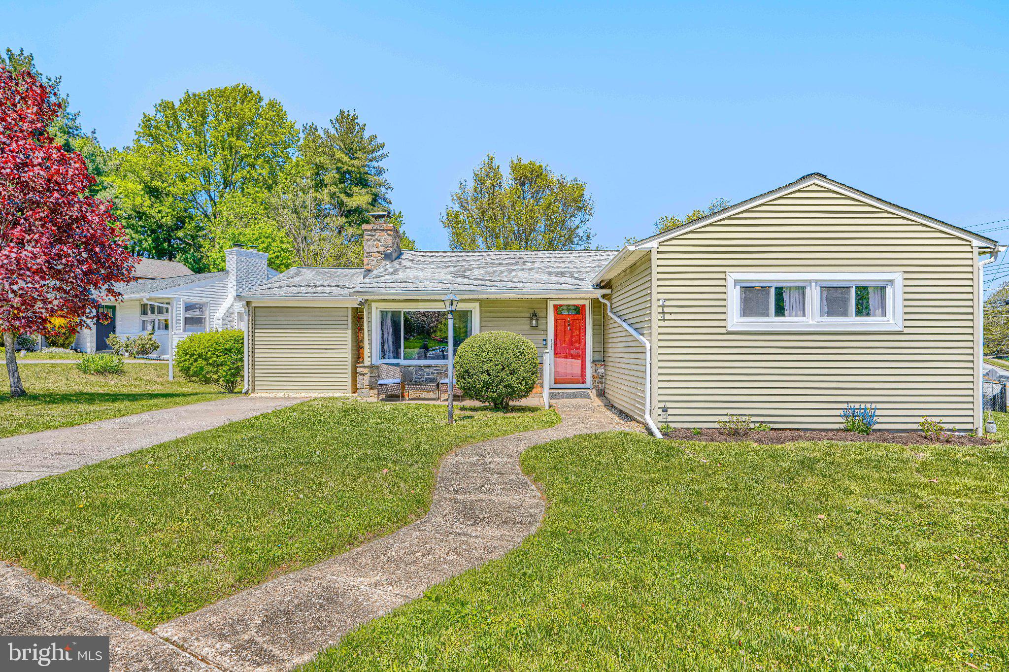 1234 St Andrews Way Baltimore, MD 21239 - Photo 2 of 38 a view of a house with a yard