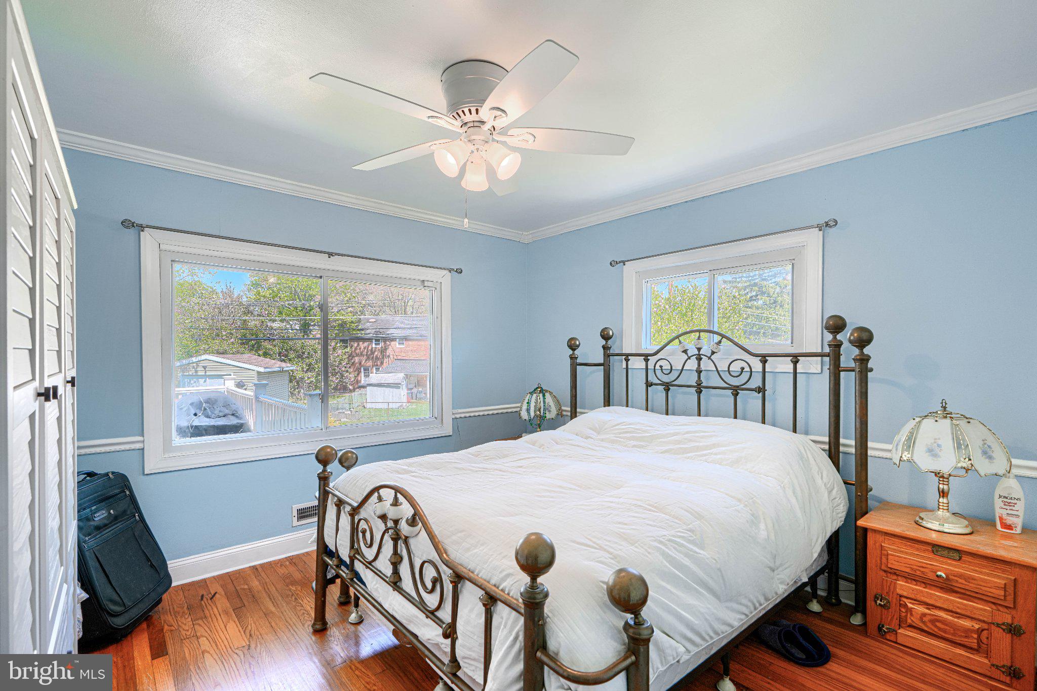 1234 St Andrews Way Baltimore, MD 21239 - Photo 31 of 38 a bedroom with a bed and a table