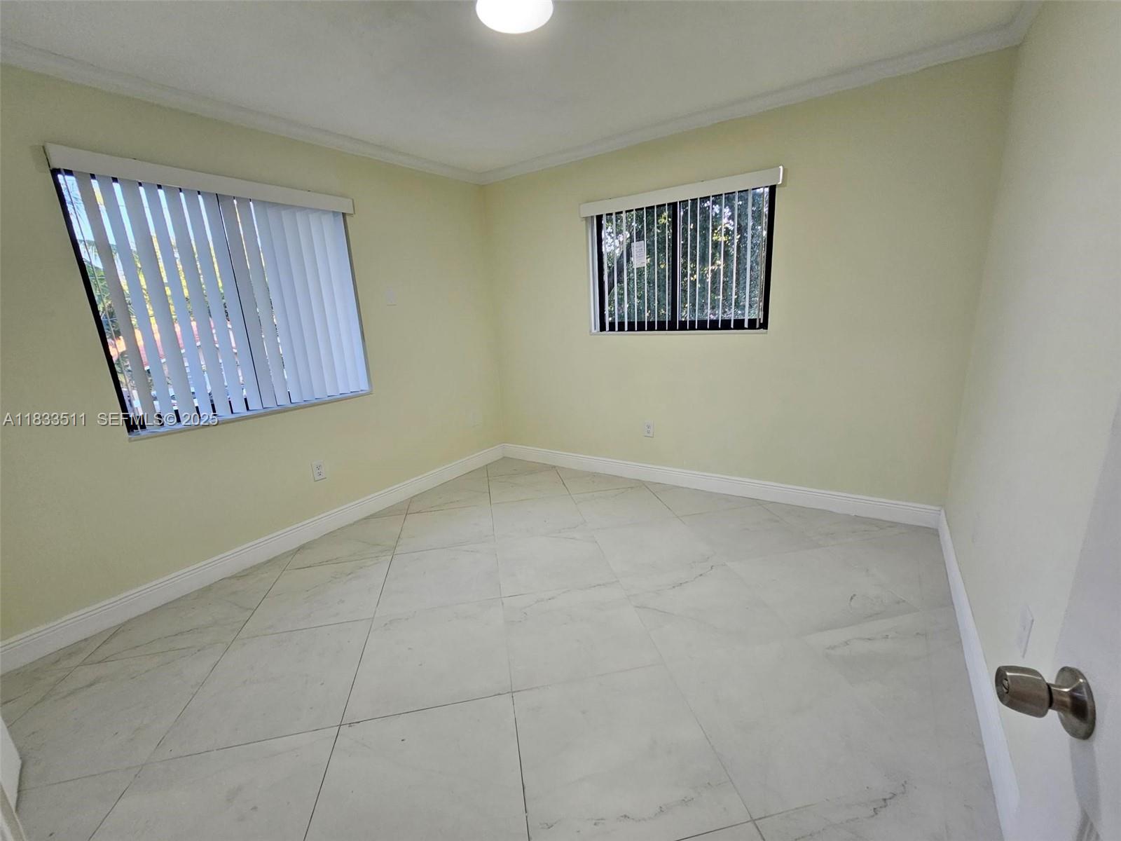 46 Northwest 35th Street, Unit 2 Miami, FL 33127 - Photo 19 of 21 a view interior of a house with an entryway