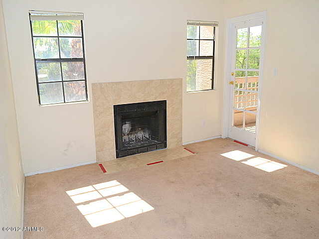 2855 South Ext Road, Unit 209 Mesa, AZ 85210 - Photo 32 of 41 023-272580-living-room-1