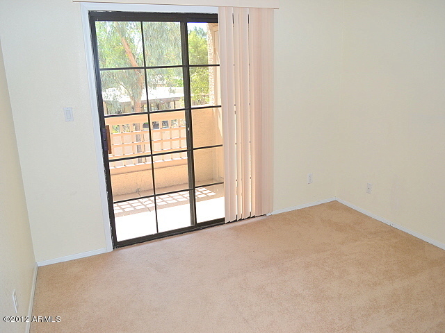 2855 South Ext Road, Unit 209 Mesa, AZ 85210 - Photo 8 of 41 023-272580-bedroom-1-a