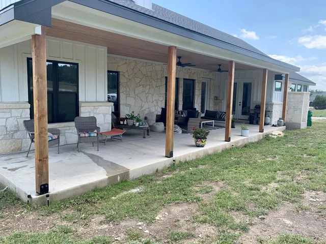 a view of a lobby with chair and front door