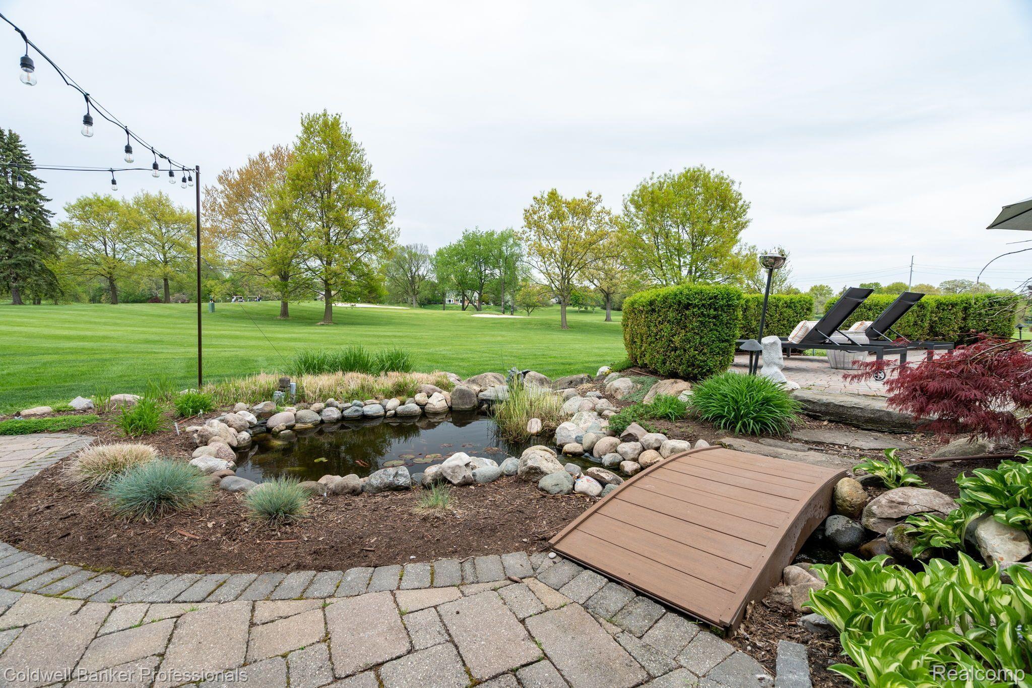 1358 Chestnut Circle Rochester, MI 48309 - Photo 36 of 46 Lower Patio with Pon