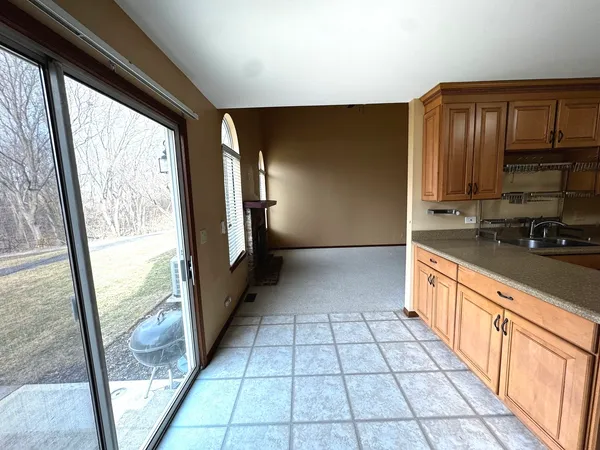 a view of a kitchen with a sink