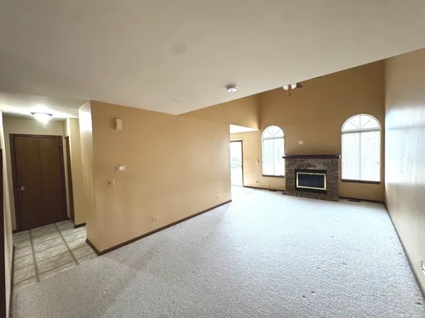 a view of a livingroom with a fireplace