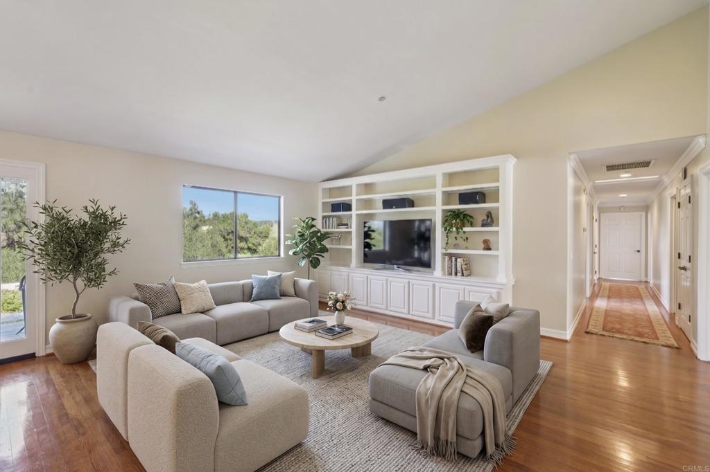 707 Live Oak Park Road South Fallbrook, CA 92028 - Photo 11 of 59 a living room with furniture and a large window