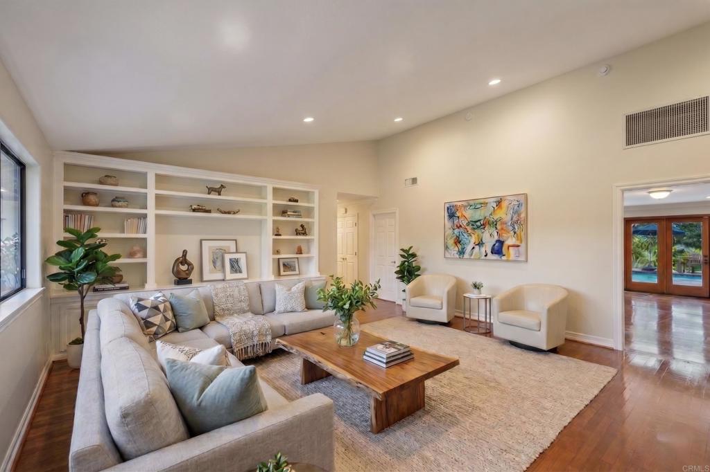 707 Live Oak Park Road South Fallbrook, CA 92028 - Photo 13 of 59 a living room with furniture and a flat screen tv