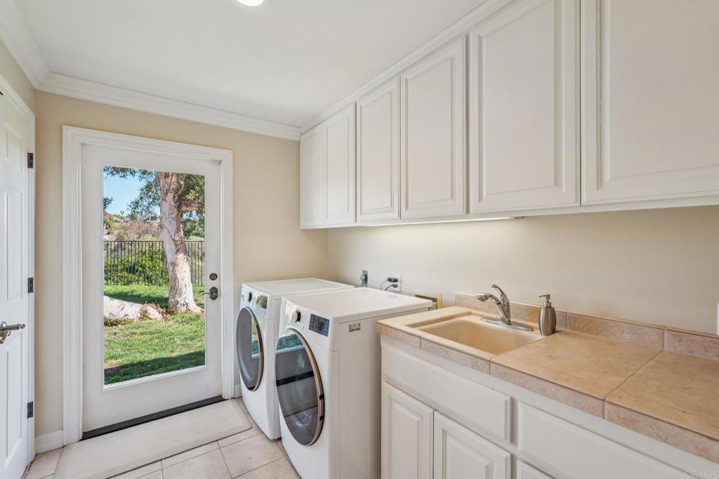 707 Live Oak Park Road South Fallbrook, CA 92028 - Photo 38 of 59 a utility room with sink dryer and washer