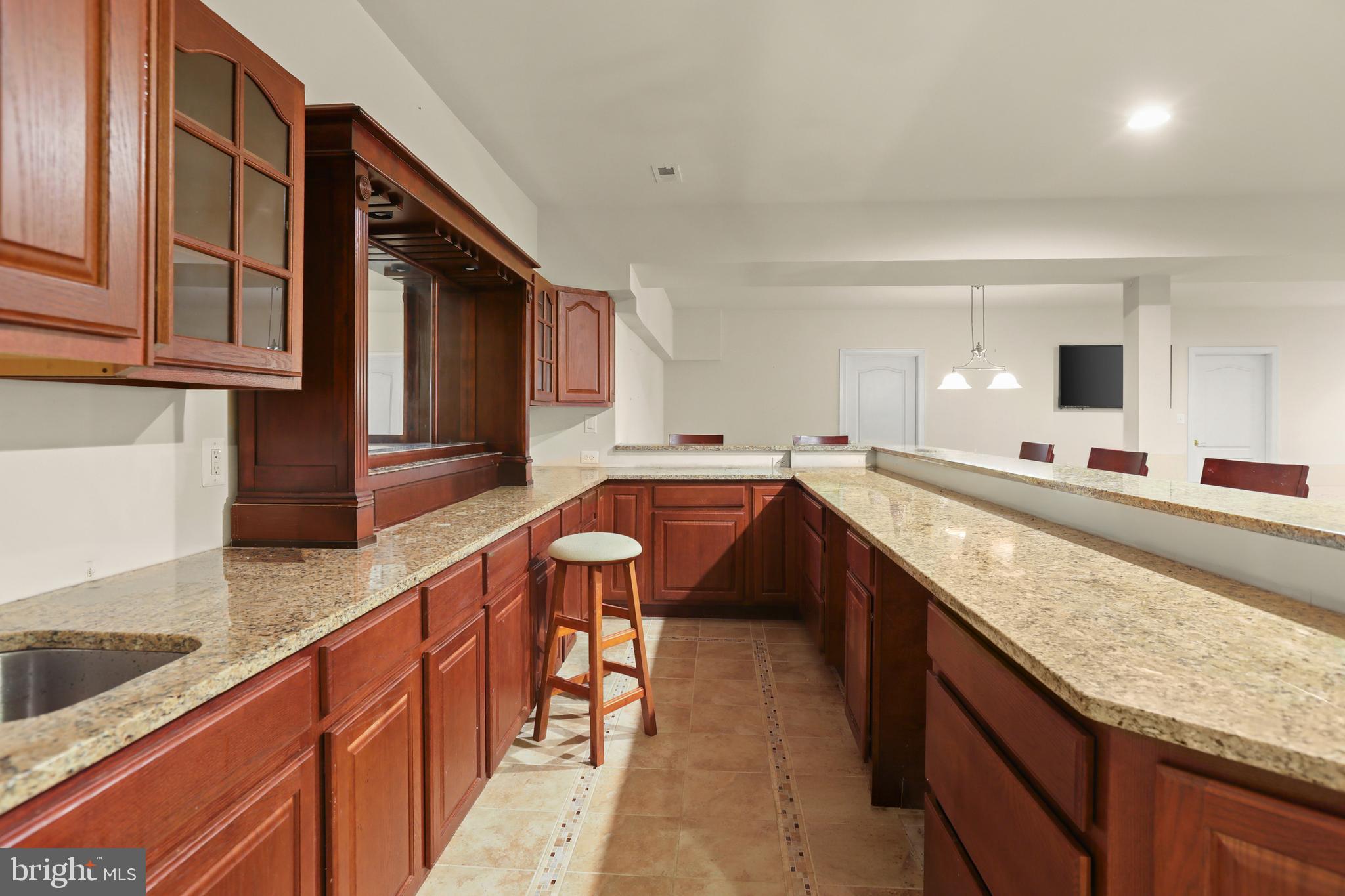 1601 Rushing Stream Court Forest Hill, MD 21050 - Photo 65 of 72 Wet Bar w/ ceramic tile w/ inlay design