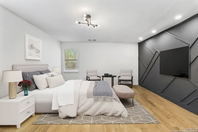 a bed room with a bed and a couch