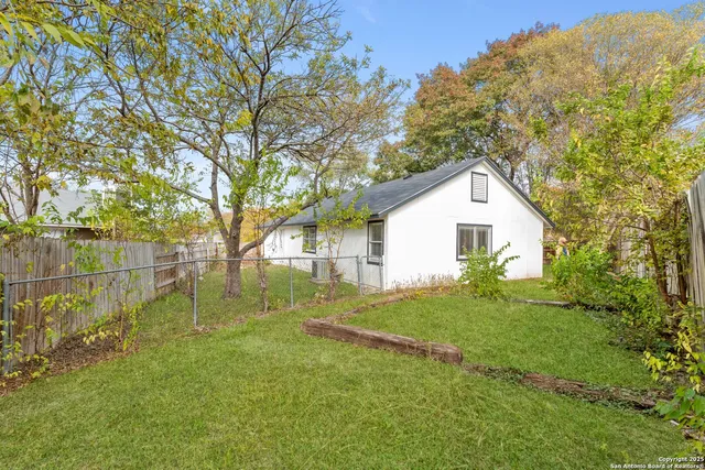 a view of backyard of house