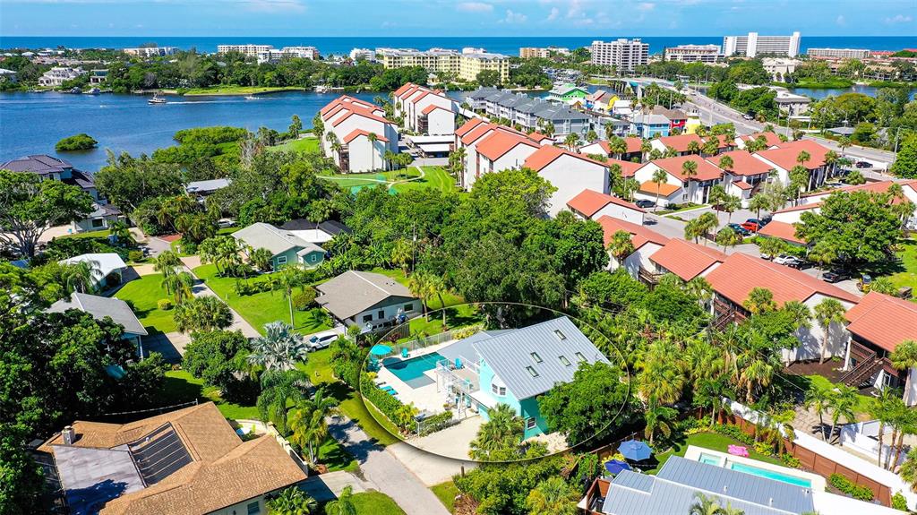 1655 Memory Lane Sarasota, FL 34231 - Photo 1 of 1 an aerial view of a houses with a lake view