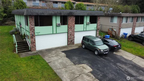 a house view with a garden space