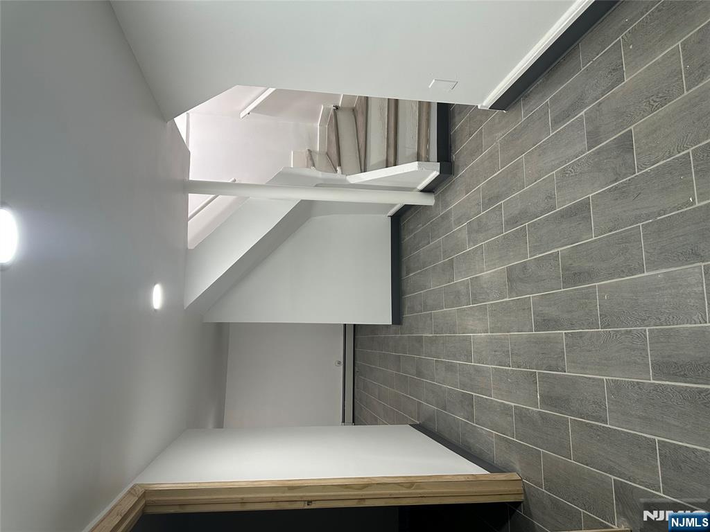 1041 Hunterdon Street Newark, NJ 07112 - Photo 18 of 25 a view of an empty room with a window