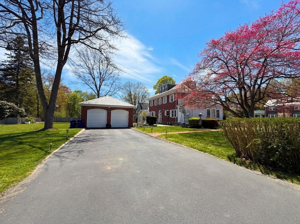 115 Hawthorn Road Braintree, MA 02184 - Photo 37 of 37 a view of house with backyard and trees