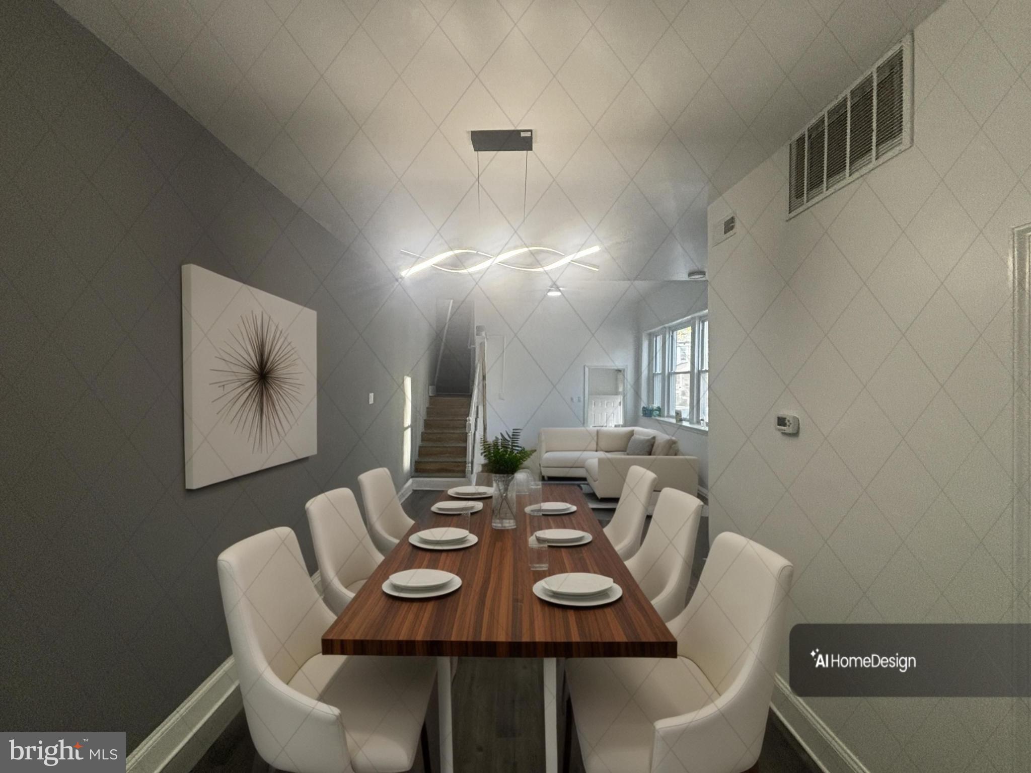 901 South 60th Street Philadelphia, PA 19143 - Photo 2 of 34 a view of a dining room with furniture and wooden floor