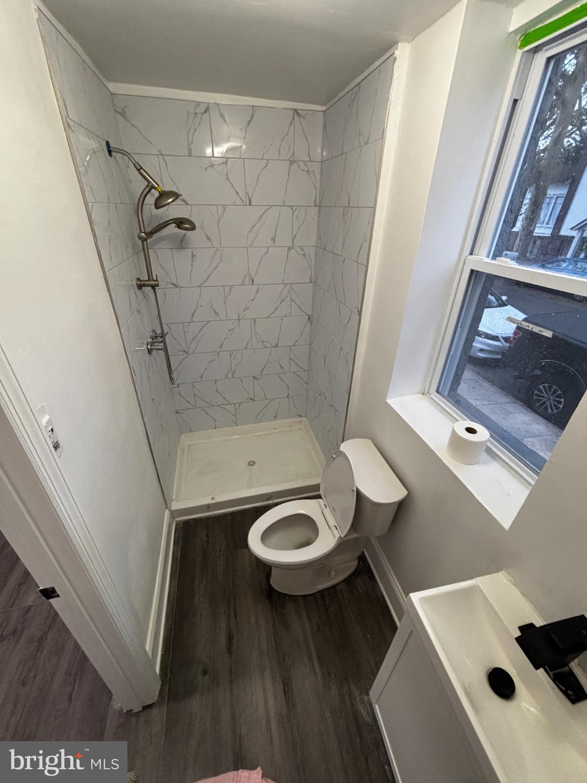 901 South 60th Street Philadelphia, PA 19143 - Photo 29 of 34 a bathroom with a sink and a toilet