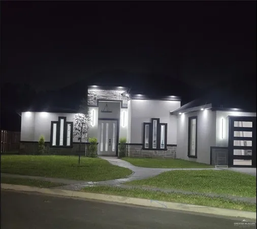 a large room with lots of green space and plants