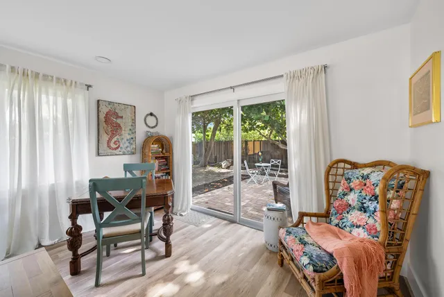 a bedroom with a bed and ceiling fan