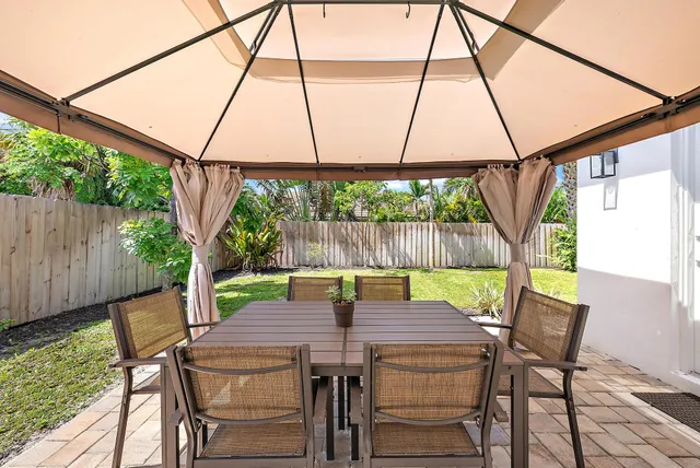 aerial view of a house with a garden and plants