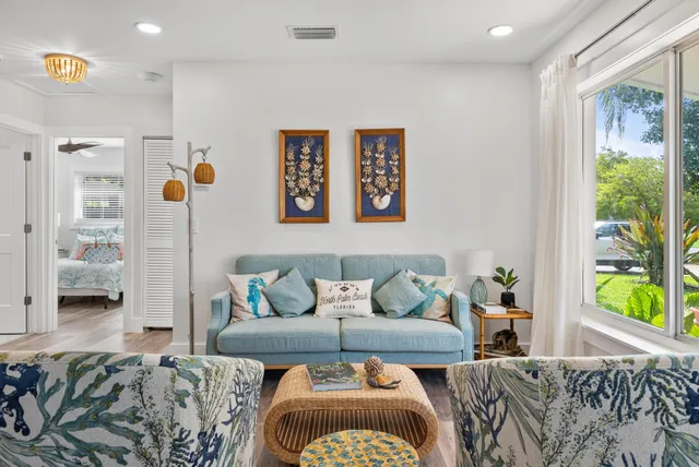 a living room with furniture and window