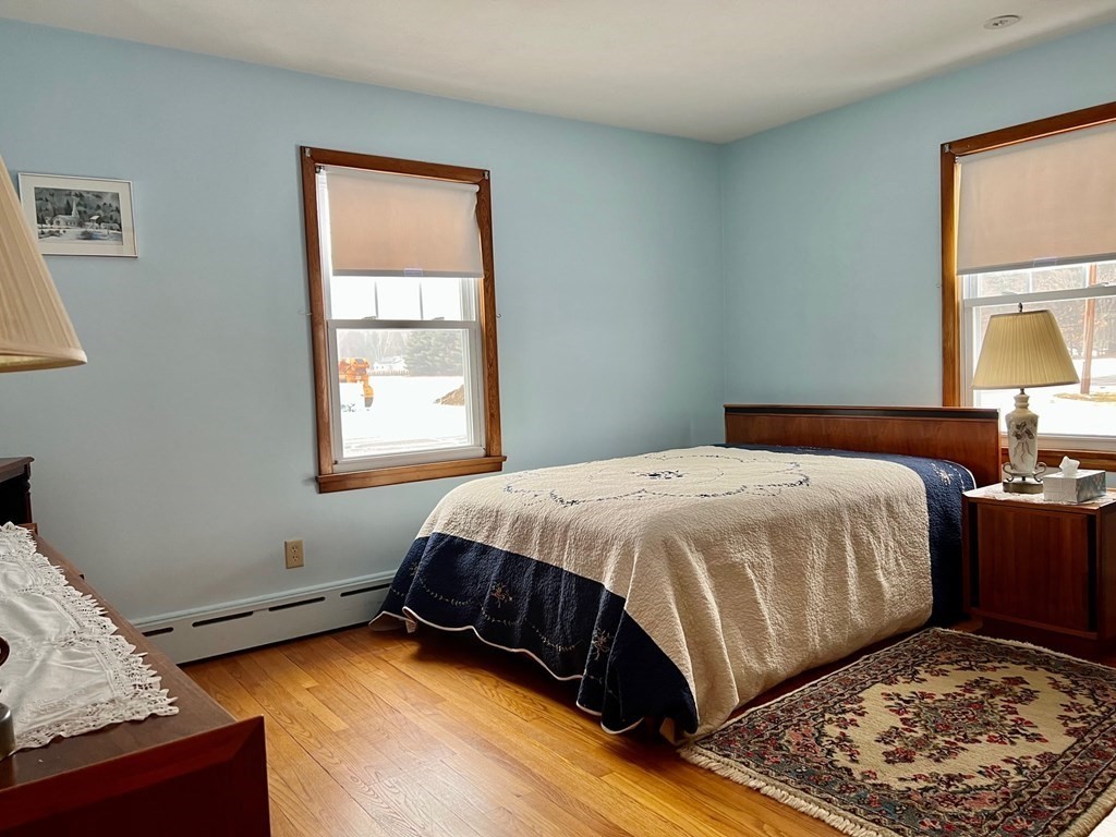 128 Depot Road Hatfield, MA 01038 - Photo 21 of 23 a bedroom with a bed and a window