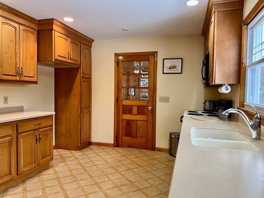 128 Depot Road Hatfield, MA 01038 - Photo 8 of 23 a bathroom with a sink a vanity and a mirror