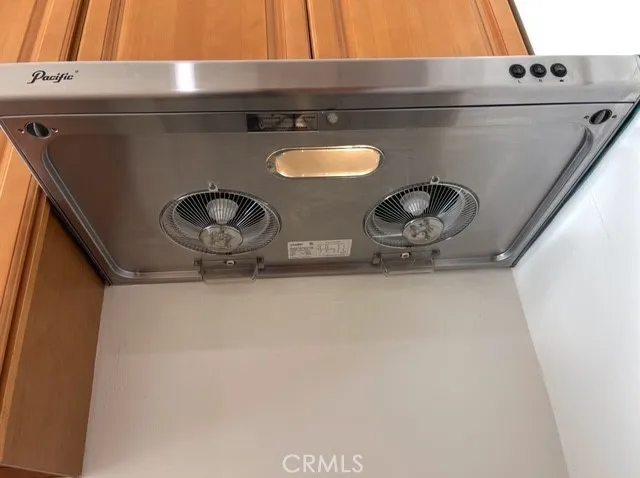 a bathroom with a toilet a sink and shower