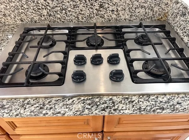 a bathroom with a toilet a sink and a mirror