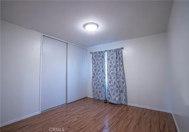 a bathroom with a toilet sink and shower