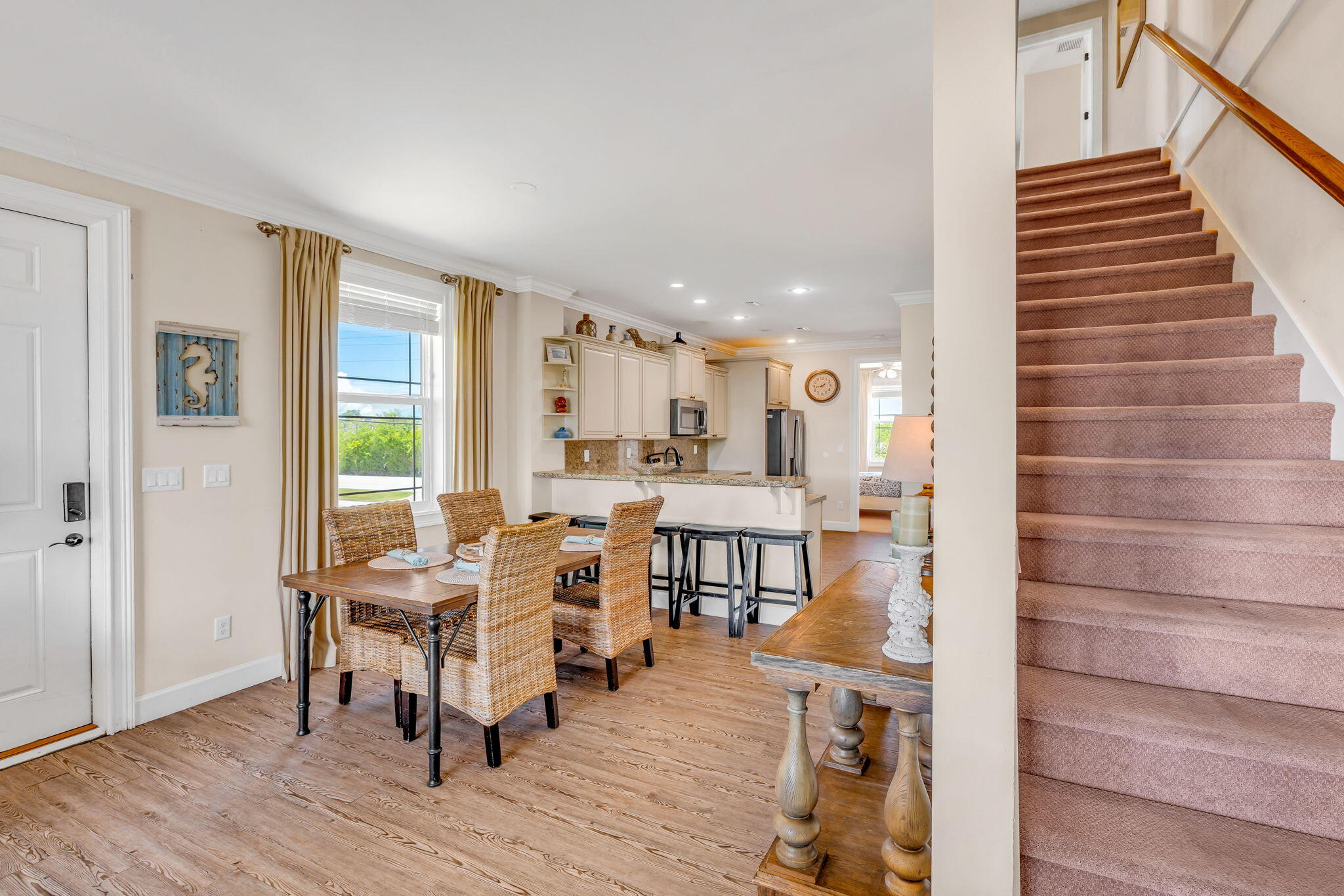 231 Sombrero Beach Road, Unit 1 Marathon, FL 33050 - Photo 11 of 52 a living room with furniture and a wooden floor