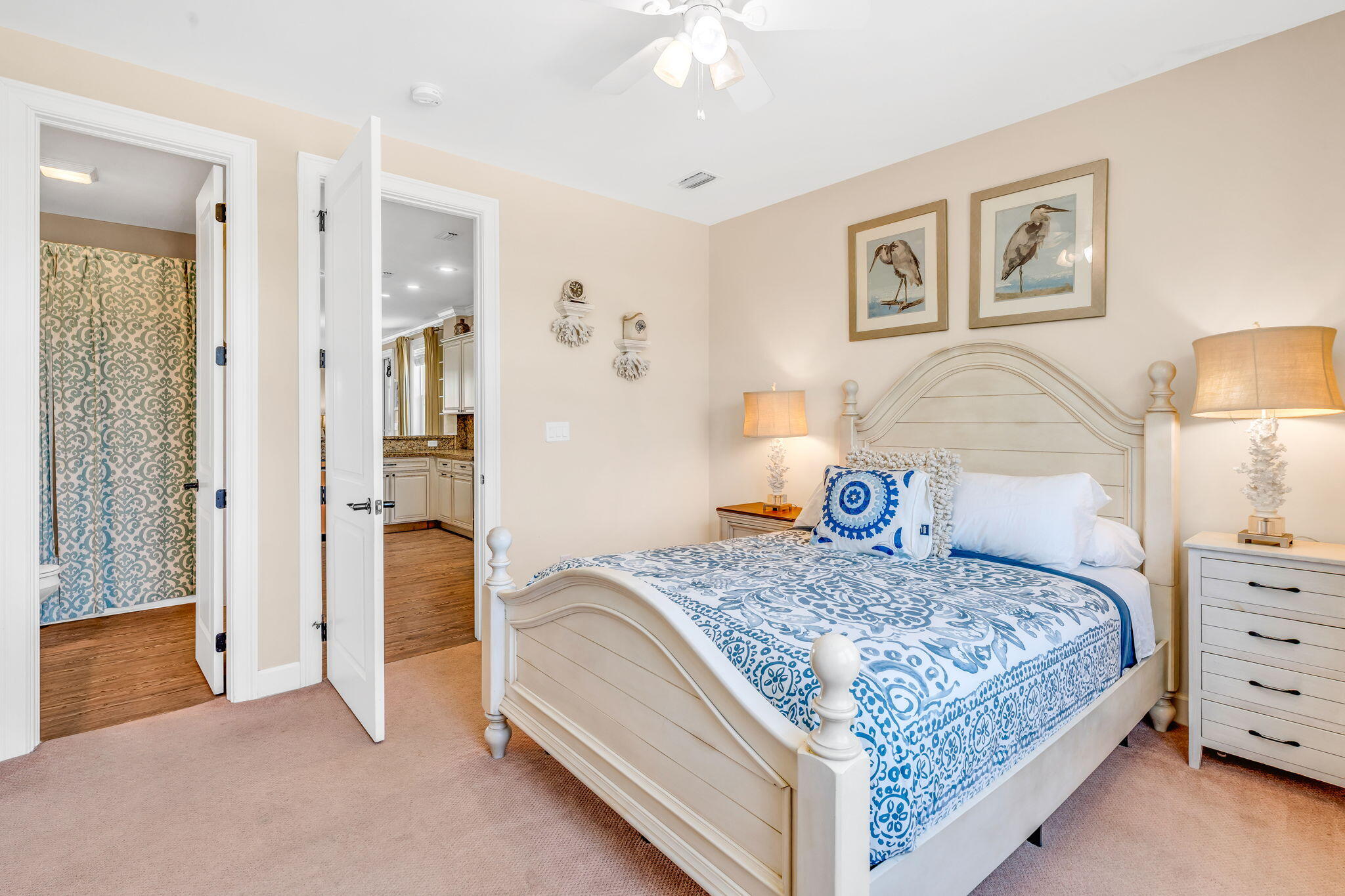 231 Sombrero Beach Road, Unit 1 Marathon, FL 33050 - Photo 17 of 52 a bedroom with a bed and a chandelier