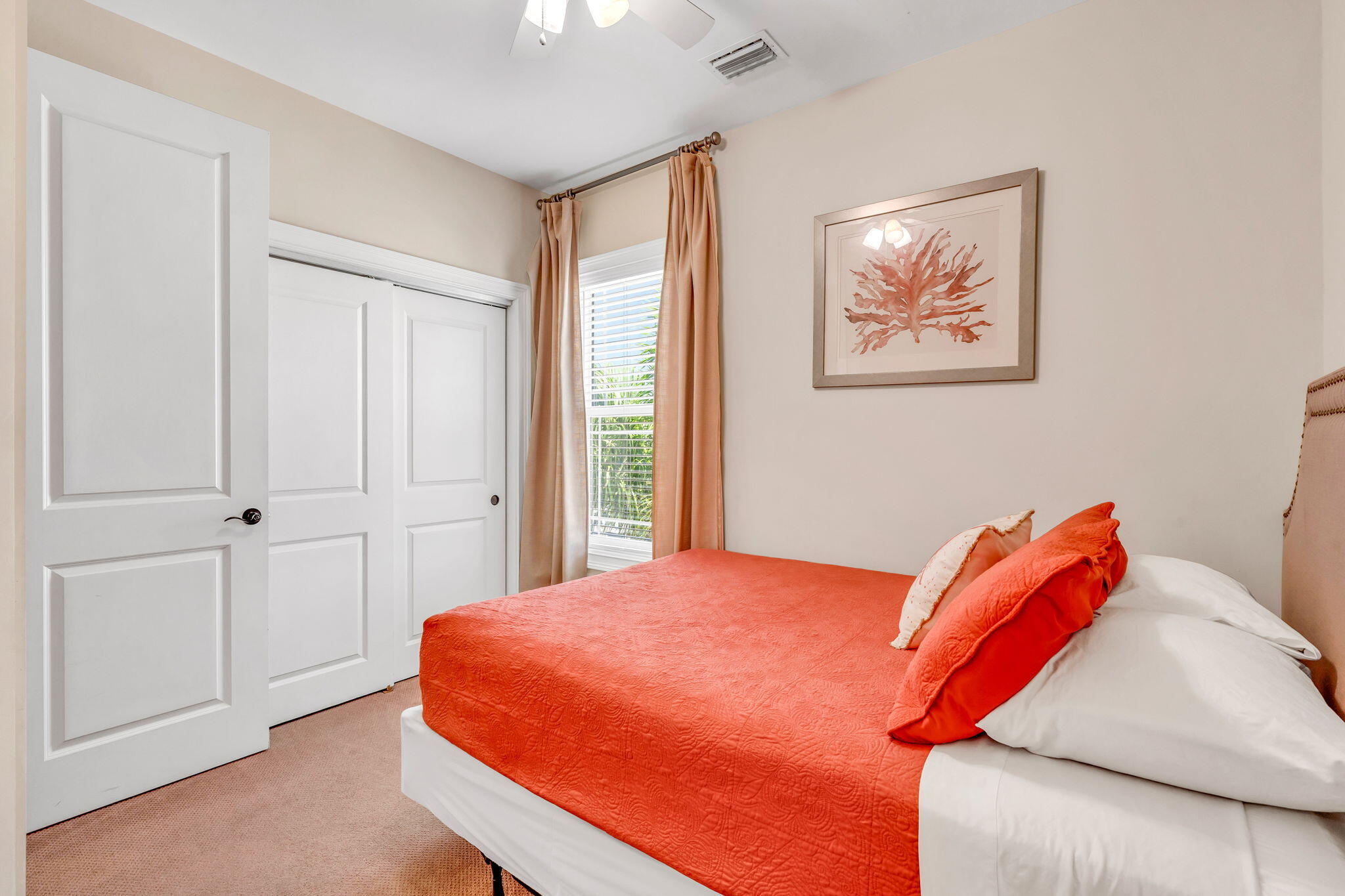 231 Sombrero Beach Road, Unit 1 Marathon, FL 33050 - Photo 23 of 52 a bedroom with a bed and a painting on the wall