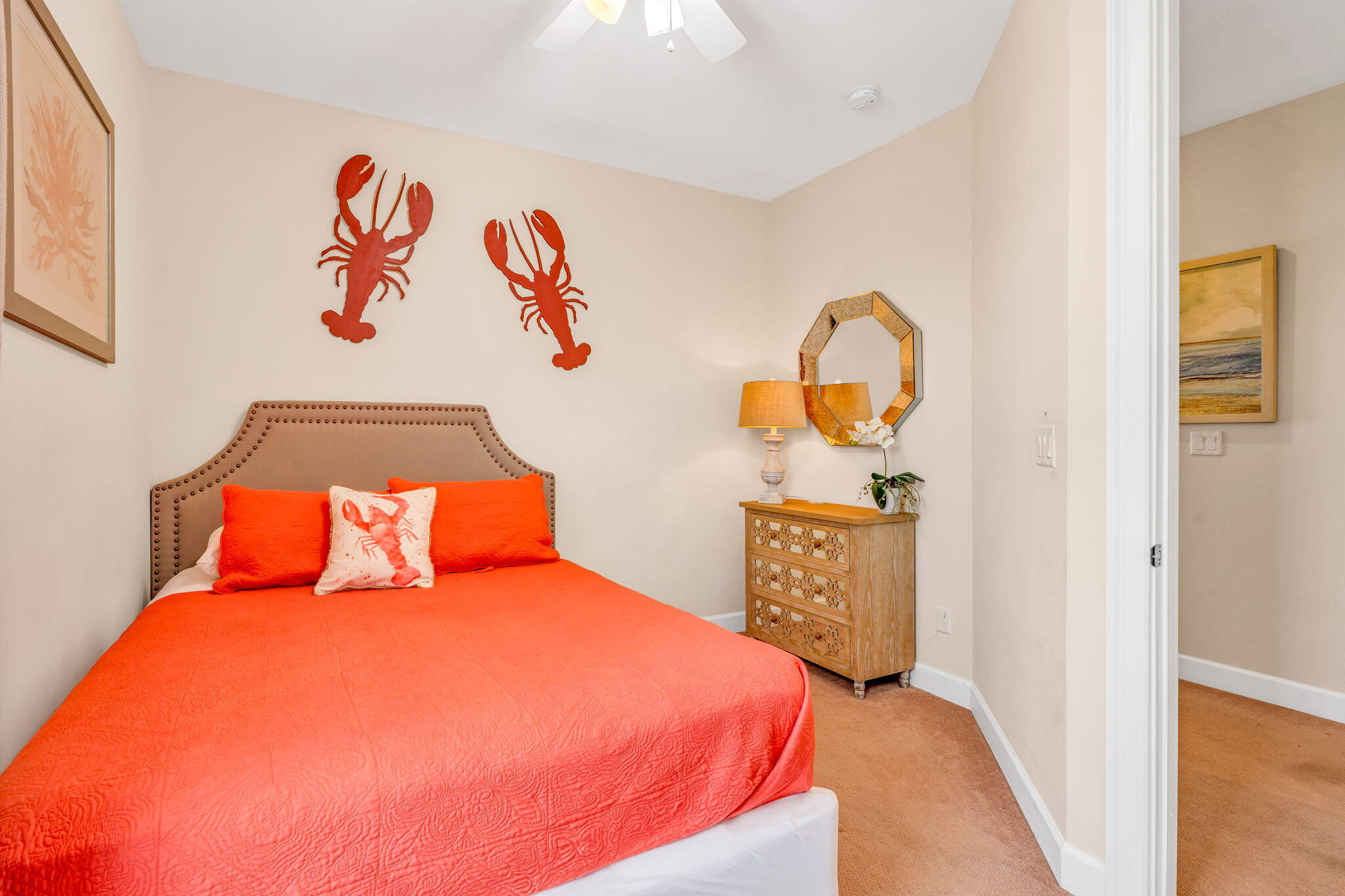 231 Sombrero Beach Road, Unit 1 Marathon, FL 33050 - Photo 24 of 52 a bedroom with a bed and a painting on the wall