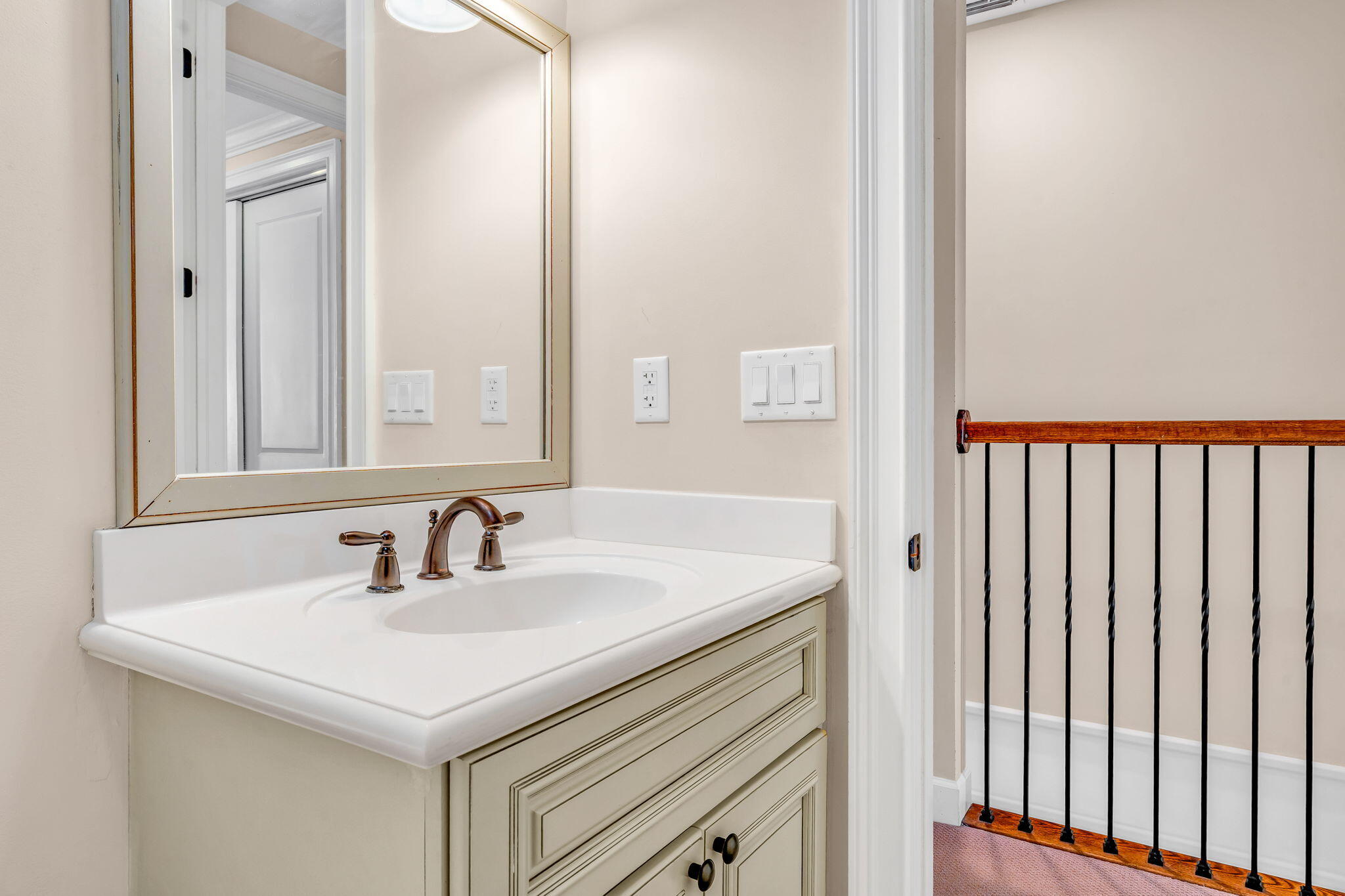 231 Sombrero Beach Road, Unit 1 Marathon, FL 33050 - Photo 26 of 52 a bathroom with a sink and a mirror