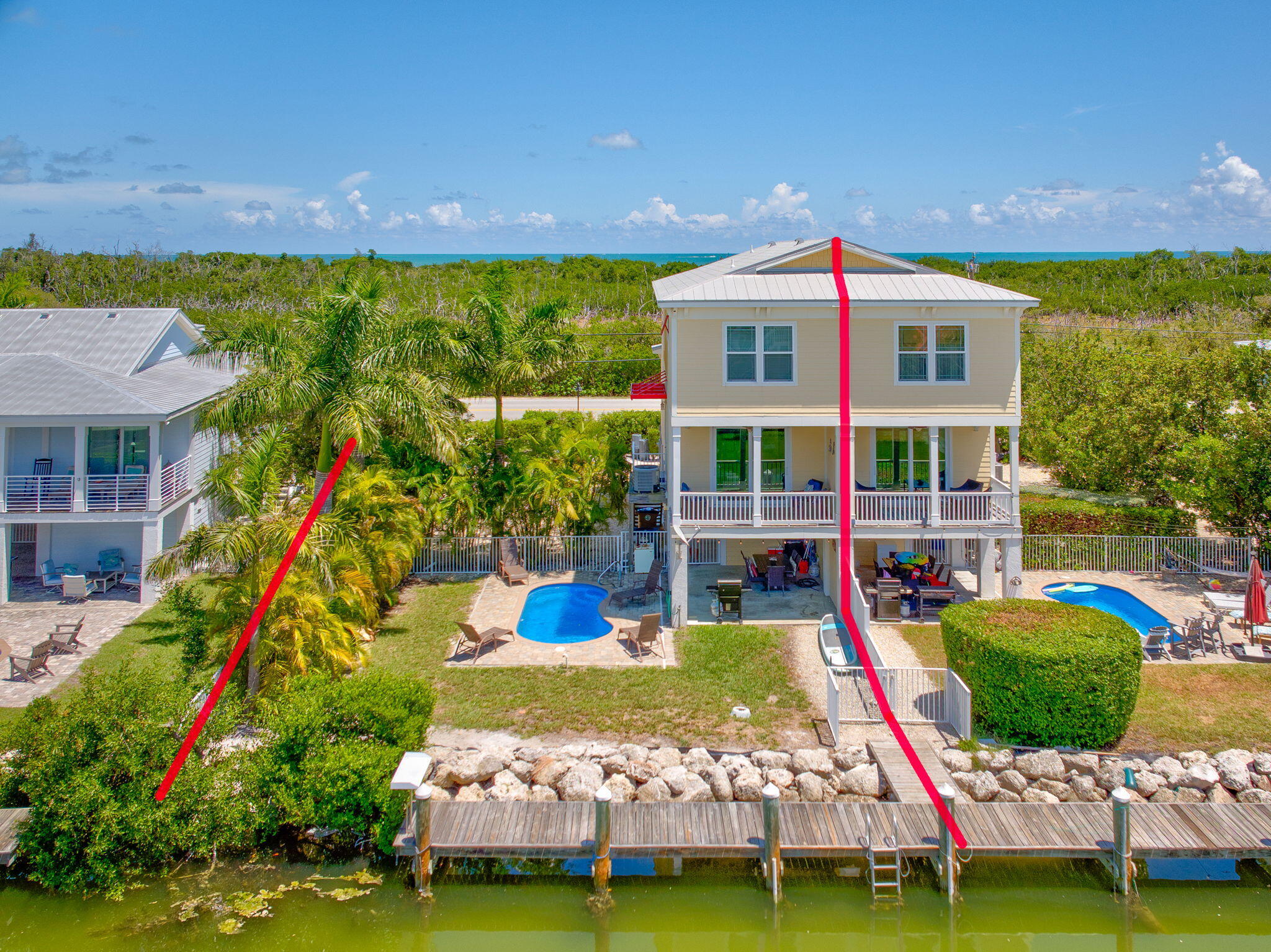 231 Sombrero Beach Road, Unit 1 Marathon, FL 33050 - Photo 38 of 52 a front view of a house with a yard table and chairs